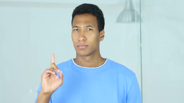 Rejecting Offer by Waving Finger, Denial by Afro-American Man alt