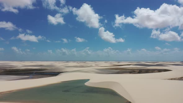 Sand dunes mountains and rain water lagoons at northeast brazilian paradise. alt