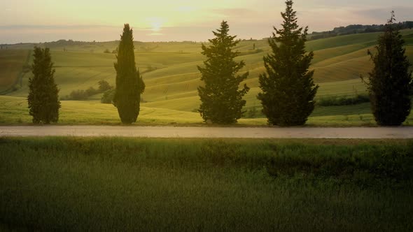 Flying over the amazing rolling hills of Tuscany Italy alt