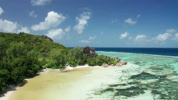 Aerial dolly from Anse Union beach toward to Anse Source d'Argent