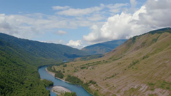 Blue Katun river in the middle of mountains of Ak-Kem valley in Altai alt