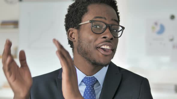 Applauding, Clapping African Businessman  alt