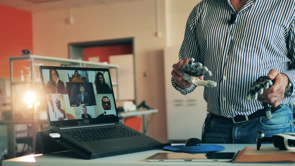 Male Tutor is Explaining Bionics to Adult Students Online alt