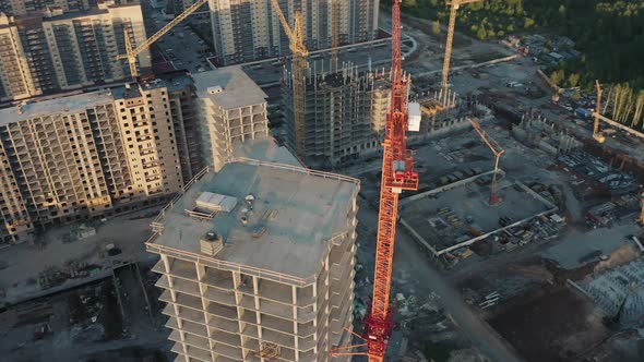 Aerial, drone moving around the monolith house in construction process