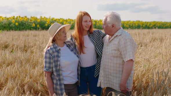 Good Looking Young Woman and Her Grandparents alt