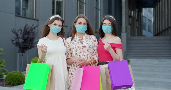 Beautiful Women in Casual Dresses Wearing Masks to Protect Coronavirus Pandemic alt