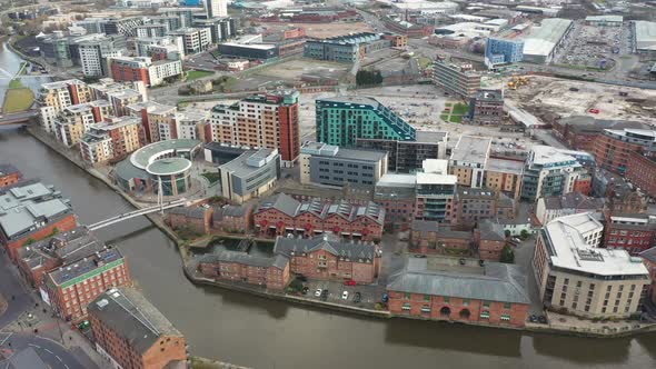 Aerial footage of the area in the Leeds City Centre known as Brewery Wharf in the UK alt
