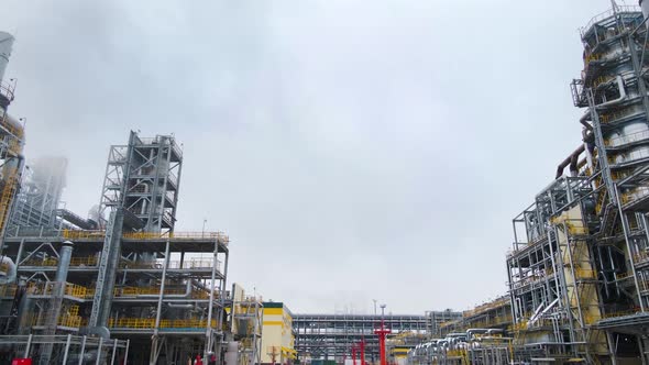 Chimney, polluting atmosphere with emissions of carbon dioxide and carcinogens alt