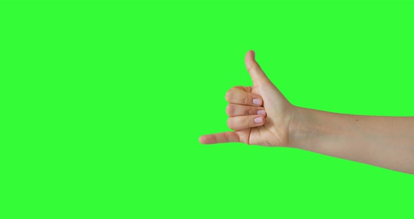 Isolated Woman Hand Showing The Shaka Surfer Hang Loose Sign, Symbol of Hemp Plants or Weed Smoke. alt