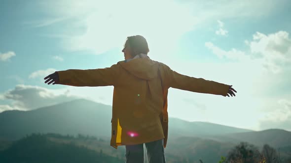 Rear View Slow Motion Broll Freedom Woman with Open Arms Enjoying Beautiful Landscape Around alt