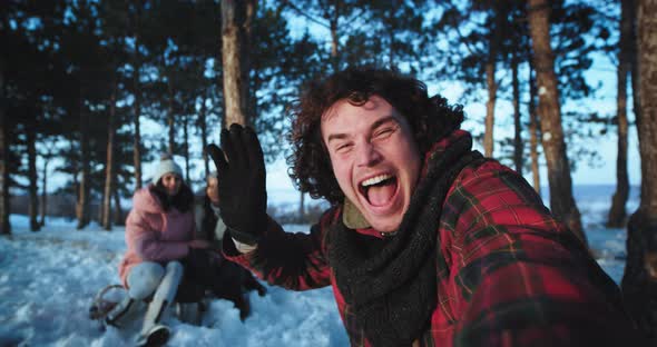 Charismatic Tourist Make a Video with His Camera alt