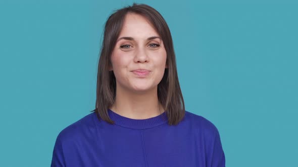 Portrait of Cute Woman Smiling with White Perfect Teeth Saying Yes and Nodding Positively Meaning alt