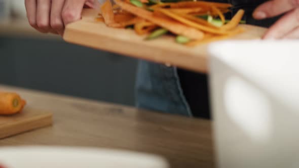 Tracking video of throwing organic waste. Shot with RED helium camera in 8K. alt