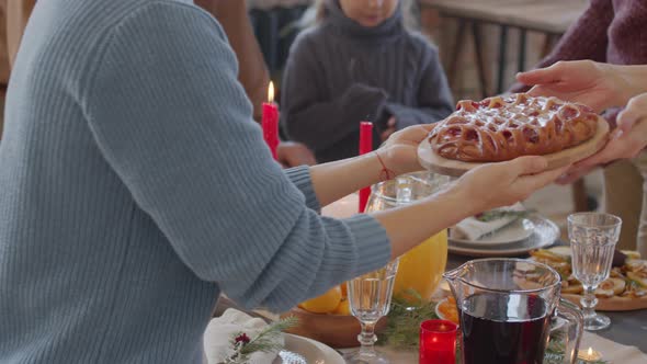 Mid-section of Family Setting Table on Christmas alt