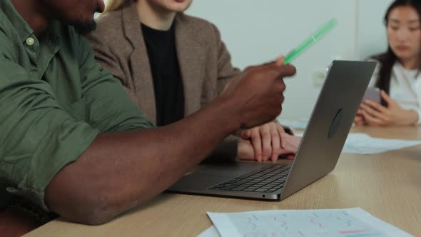 Business People Working and Communicating at Office Desk Together alt