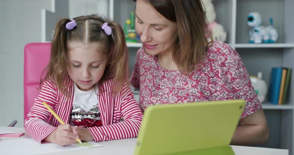 Girl Have Homework at Distance Learning Quarantine Covid-19 alt