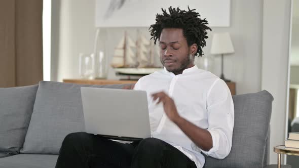 Tired African Man Having Headache at Home  alt