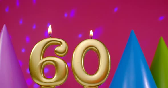 Burning Birthday Cake Candle Number 60
