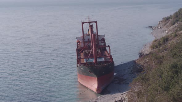 The Ship Ran Aground. Environmental Pollution at Sea. Aerial View. Grounded Ship. Drone Footage alt