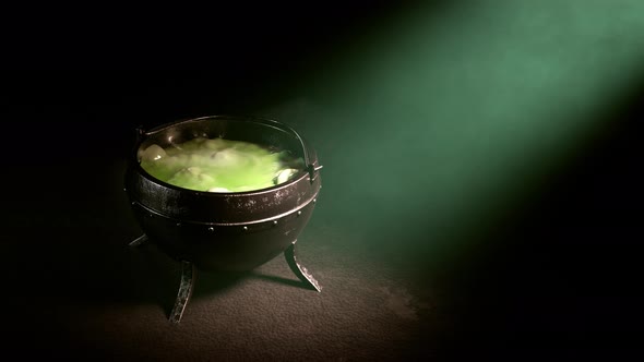 Poison soup boiling in metal pot.