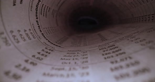 Macro Shot Through Newspaper Pages alt