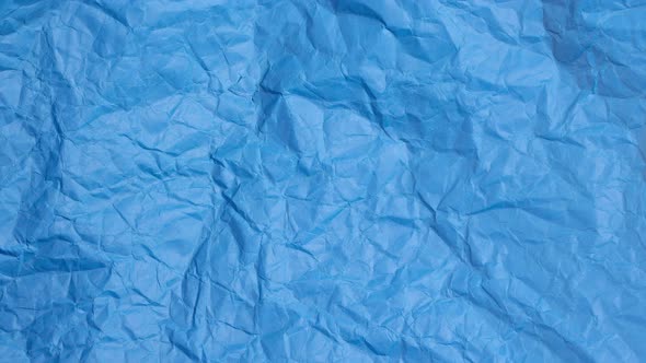 Stop Motion of Crumpled Blue Paper Background