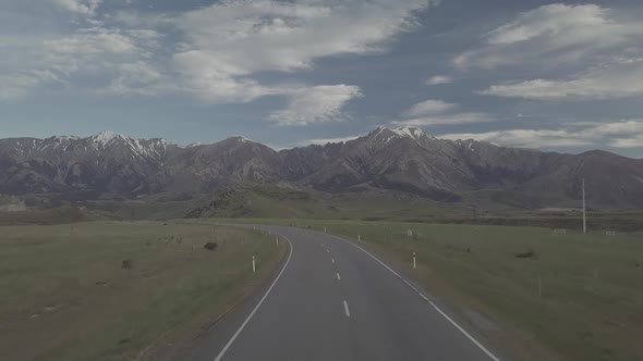 Aerial of empty road in mountains