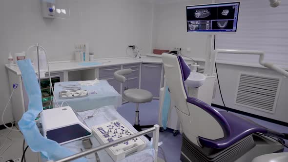 Moving Shot of Interior of Office of Dental Clinic with New Modern Equipment Without People alt