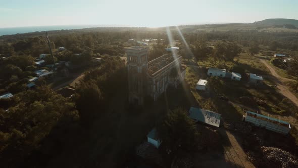 Aerial view of ruined, abandoned church alt