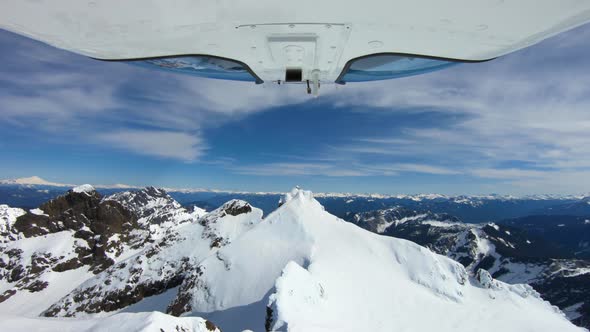Flying Above House On Top Of Mountain Peak - Amazing Shot Backcountry Refuge alt