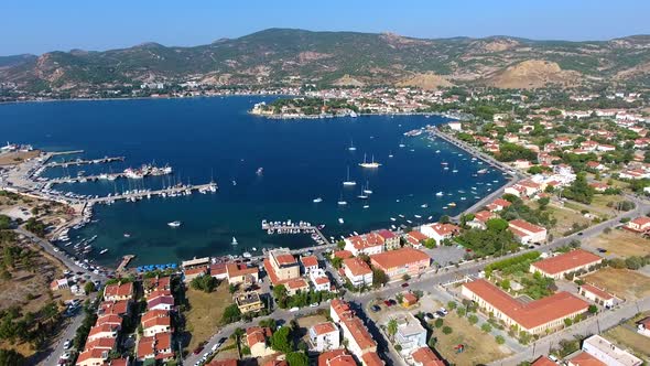 Small City Houses, Beautiful Marina and Touristic Boats in a Bay by Sea