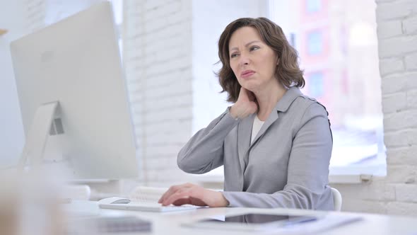 Tired Creative Old Woman Having Neck Pain alt