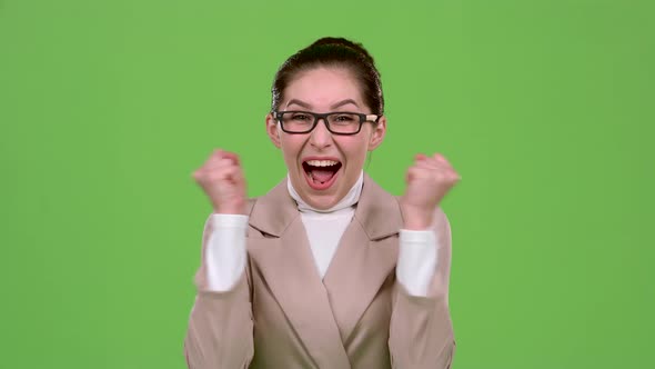 Girl Rejoices in Victory. Green Screen. Slow Motion alt