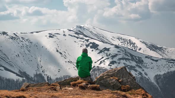 Man Sit on Rock in Spring Mountains