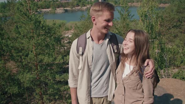 Young Couple Posing on Hike alt