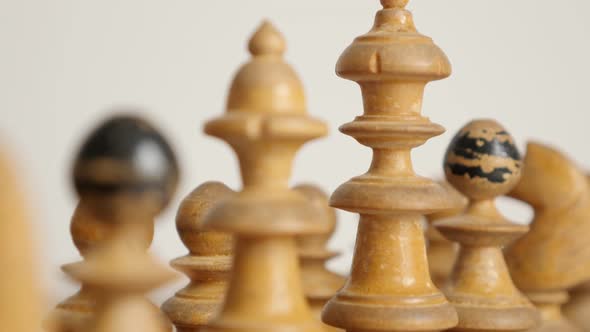 Slow tilt on white player king   positioned  on  chequered fields 4K 2160p 30fps UltraHD  footage -  alt