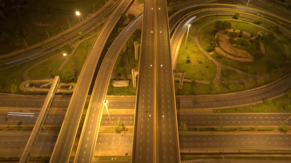4K : Time lapse Aerial view and top view of traffic on city. Expressway with car lots alt