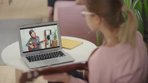Girl Learning Ukulele Playing alt