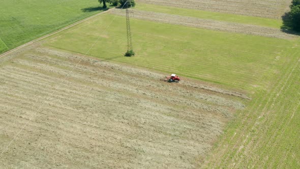 Red Tractor Hay Tedder Aerial View