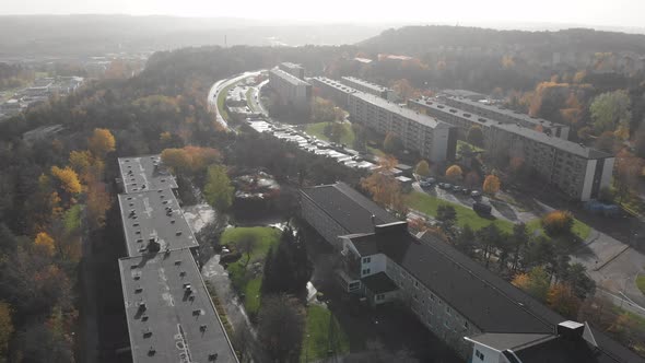 Misty Autumn Foliage at Residential Suburban Area Aerial Forward alt