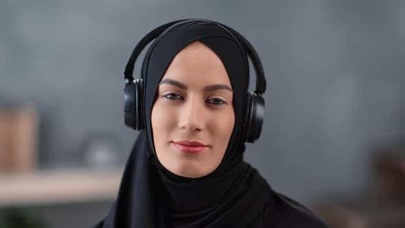 Closeup Face Islamic Young Woman Enjoying Audio Sound Wearing Headphones alt
