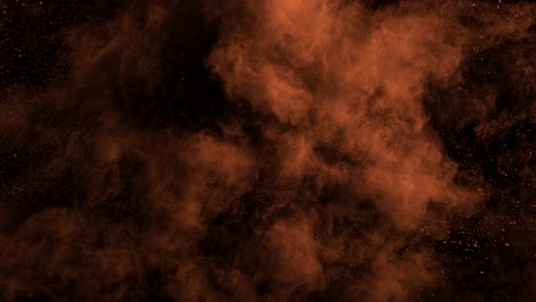 Super Slow Motion Shot of Cocoa Powder Explosion Isolated on Black Background at 1000Fps alt