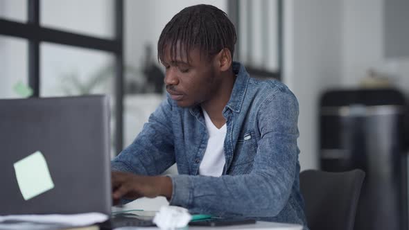 Middle Shot Portrait of Busy Man Planning Business Startup Idea Sitting in Home Office alt