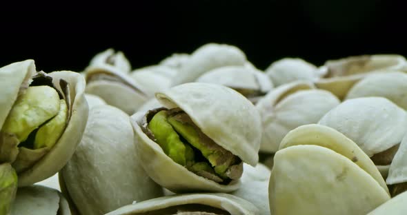 Macro Lens Very Closeup Macro Shot of a Pistachio in Beautiful Light on a Black and Yellow alt