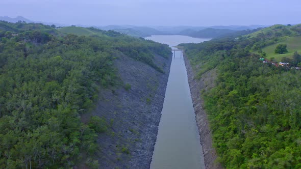Taveras dam, Santiago de los Caballeros in Dominican Republic. Aerial forward alt