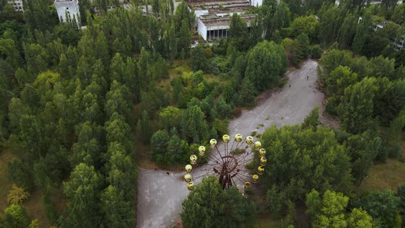 Aerial view of old abandoned Ferris wheel in the ghost town Pripyat