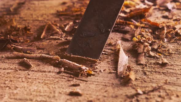 Local man using chisel making traditional handicrafts. alt