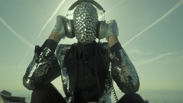 Mr Disco Man with Sparkly Face and Headphones alt