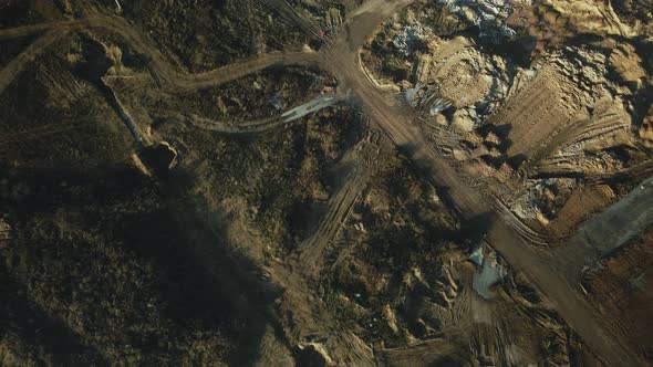 Construction site in a city vacant lot. Photographed in cloudy weather. alt