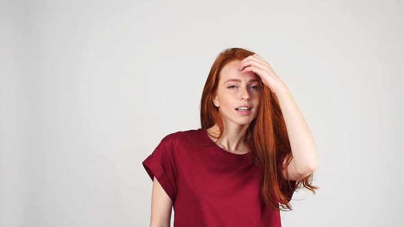 Closeup Beauty Portrait of Woman Face with the Red Hair, Slow Motion.
